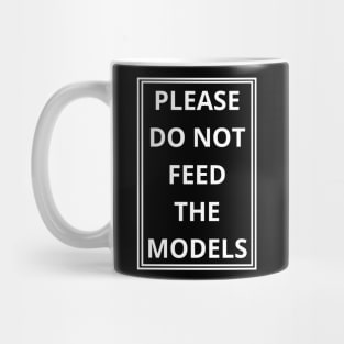 please do not feed the models Mug